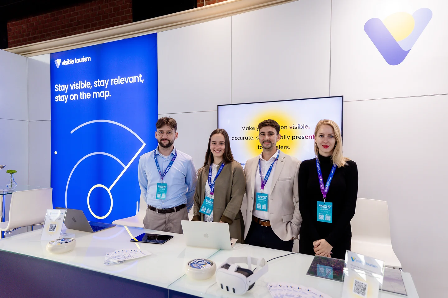 The Visible Tourism team at its Tourism Summit 2025 exhibition stand.